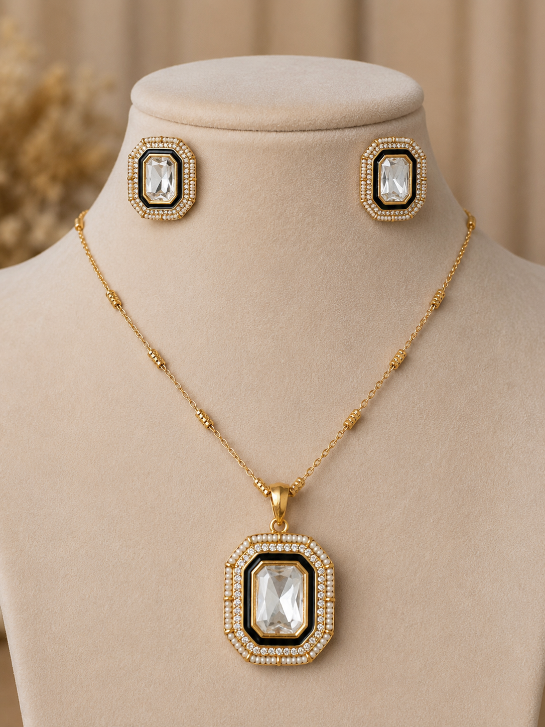 Octagonal Gold Jewelry Set with Clear Gemstones and Black Enamel Detailing