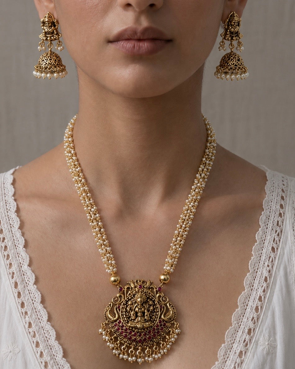 Radiance of Tradition: Pearl & Gold Temple Jewelry Set