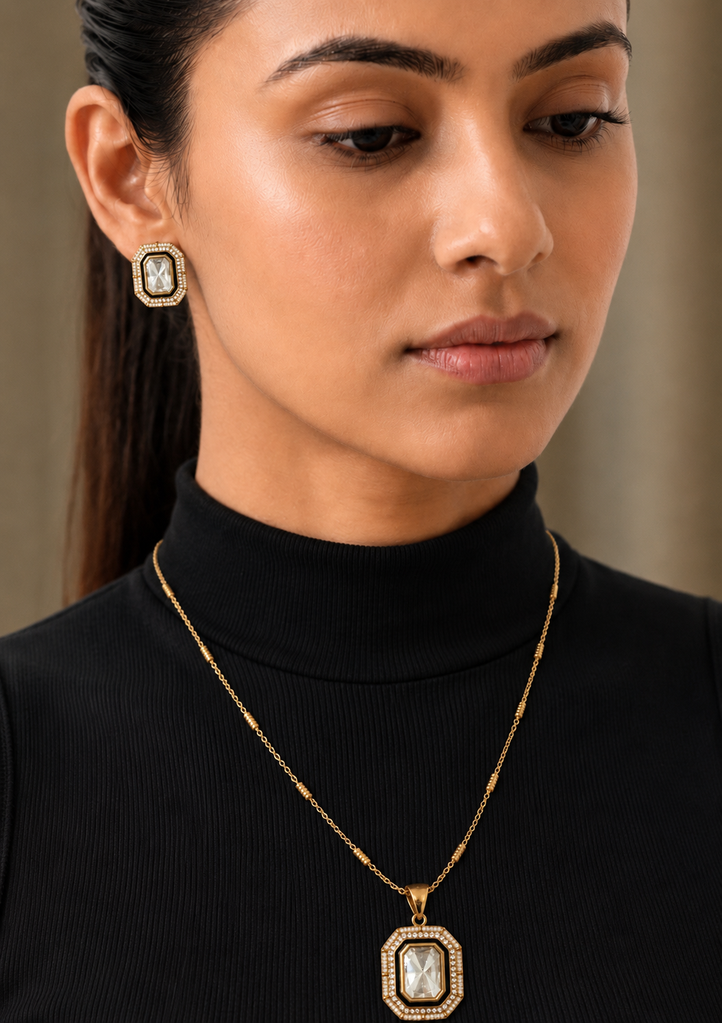 Octagonal Gold Jewelry Set with Clear Gemstones and Black Enamel Detailing