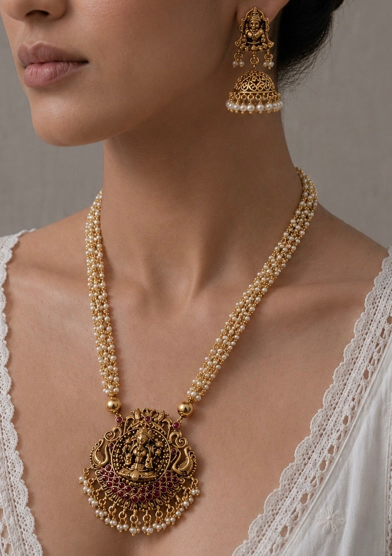 Radiance of Tradition: Pearl & Gold Temple Jewelry Set