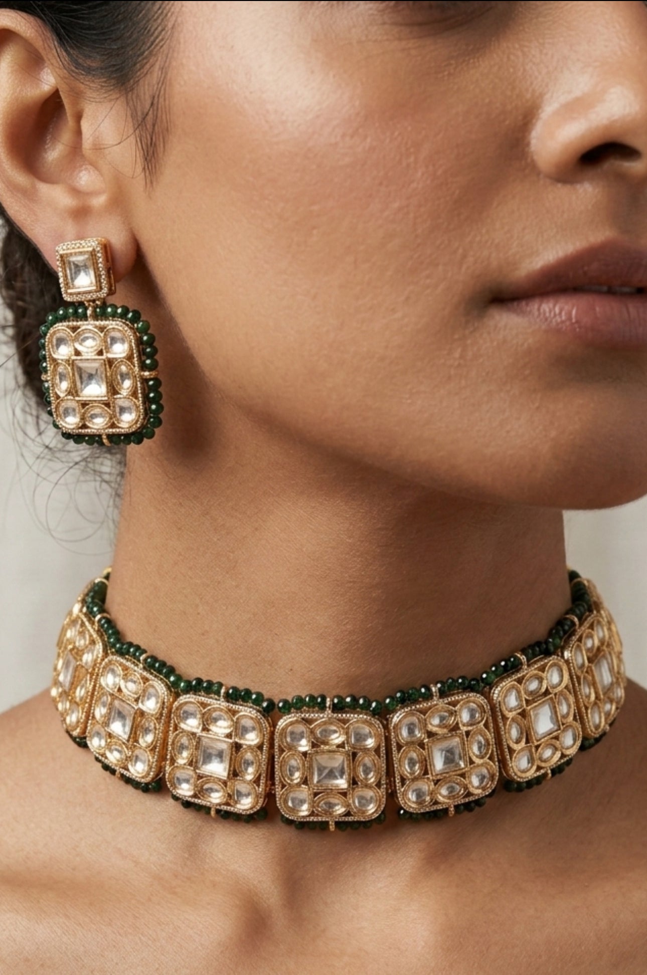 Gold & Kundan Choker Set with Green String Accents