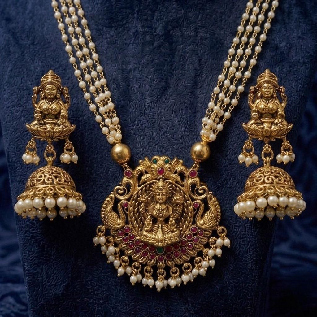 Radiance of Tradition: Pearl & Gold Temple Jewelry Set