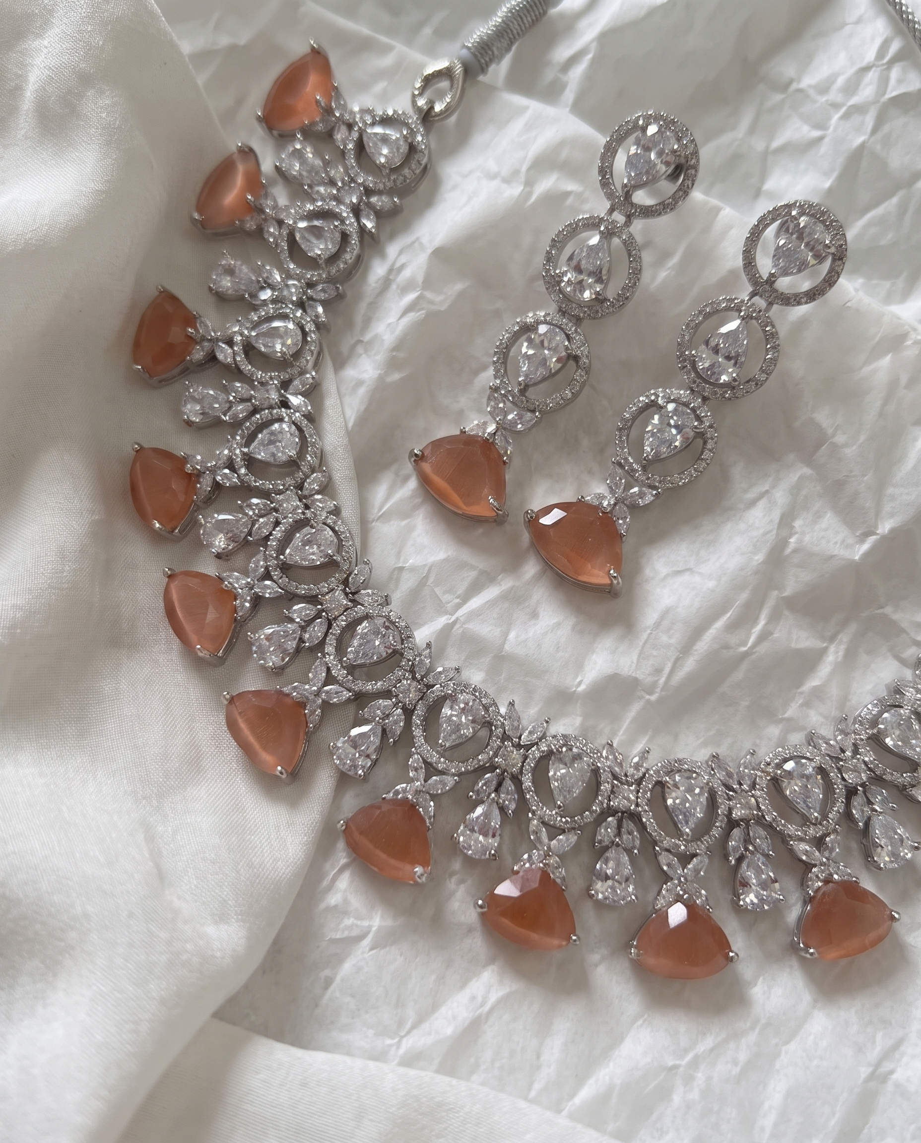 Silver-Finish Necklace and Earring Set with Teardrop and Round Stone Accents