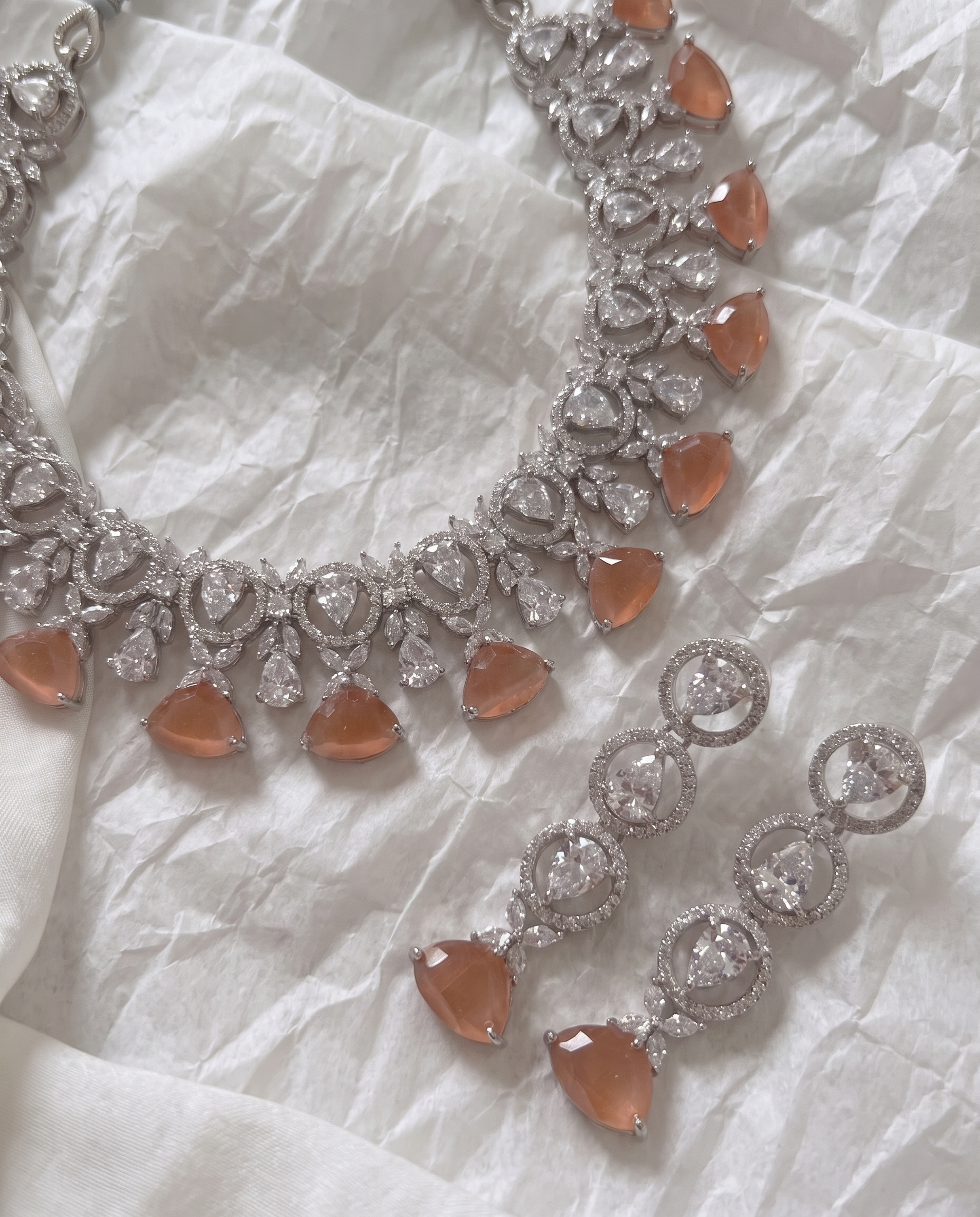 Silver-Finish Necklace and Earring Set with Teardrop and Round Stone Accents