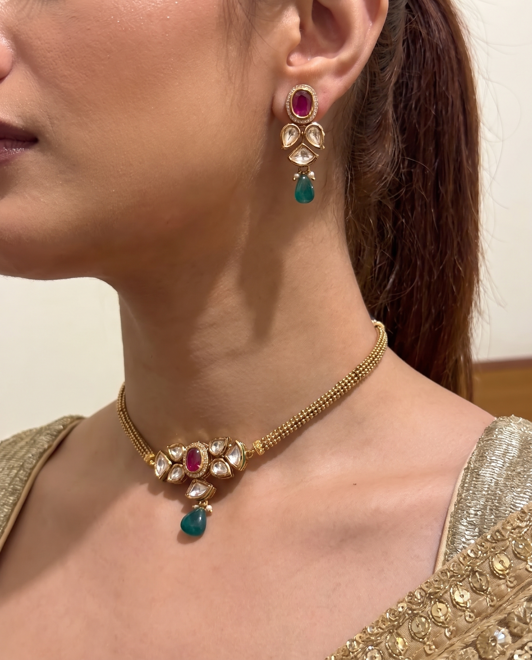 Elegant Kundan necklace Set with Ruby and Emerald Accents
