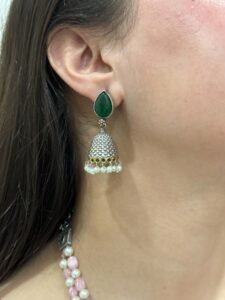 Elegant Pink Beaded Necklace with Green Enamel Pendant and Jhumka Earrings