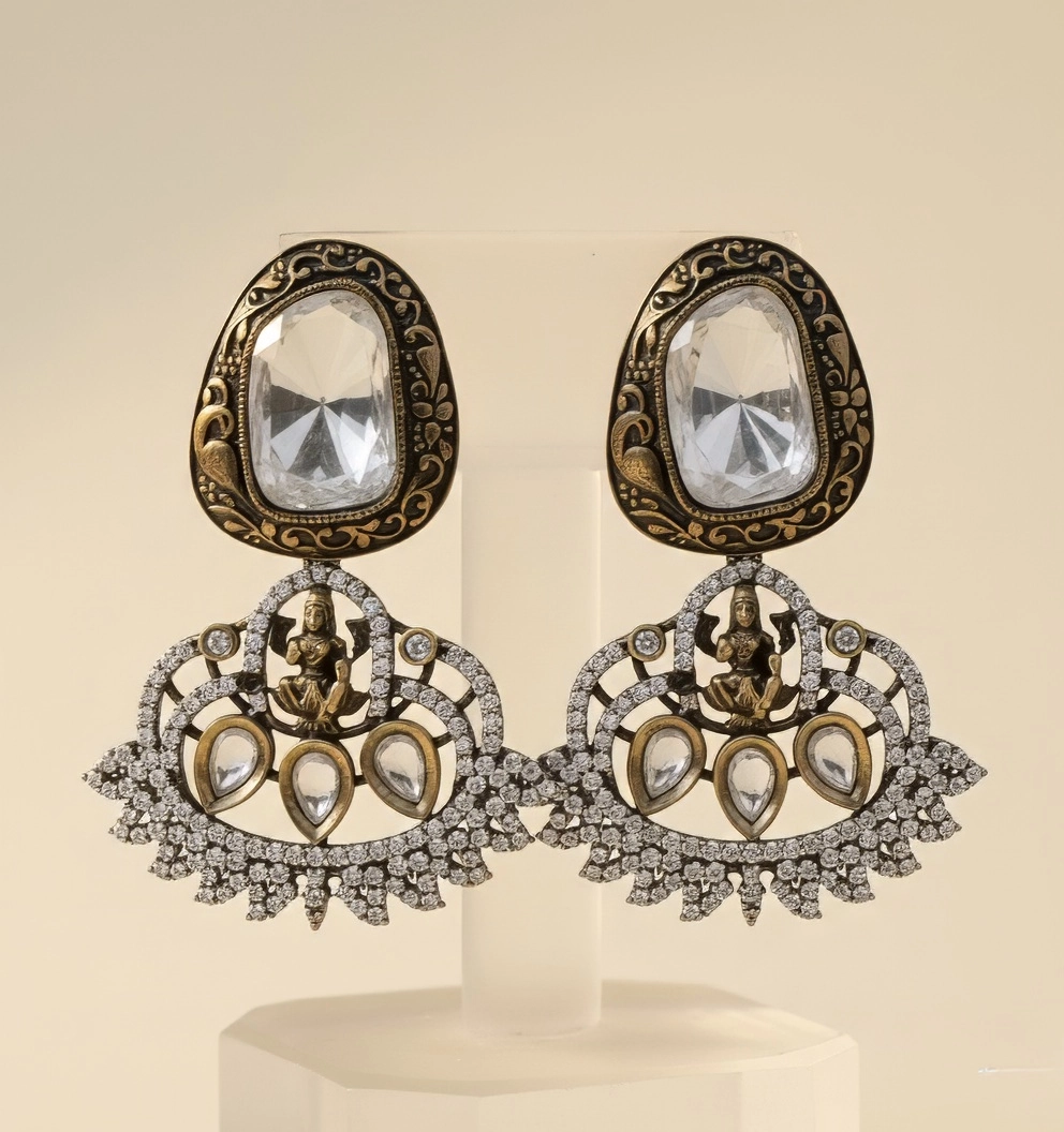 Divine Opulence: CZ Stone Earrings with Laxmi Centerpiece